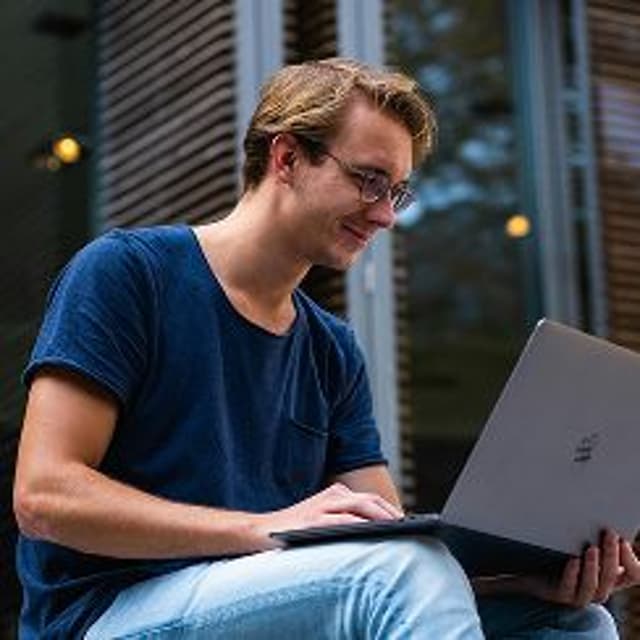 person using laptop