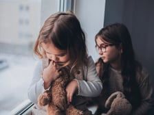 Little kids with anxiety staring out the window