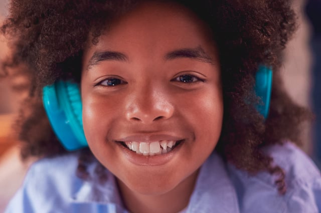 Young girl smiling at the camera