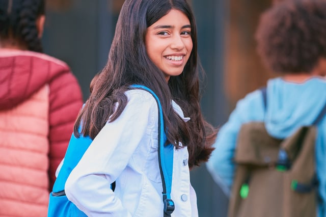 Young girl going to school