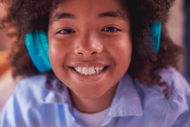 Young girl smiling at the camera