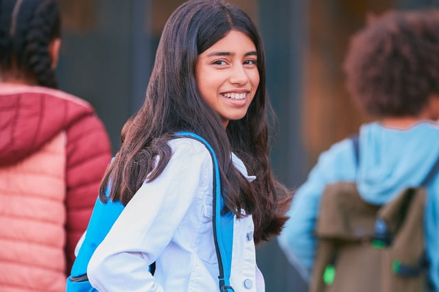 Young girl going to school
