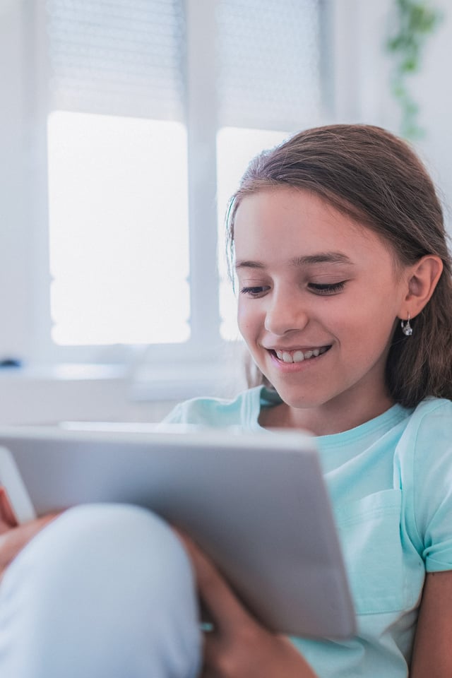 Young girl on a tablet computer
