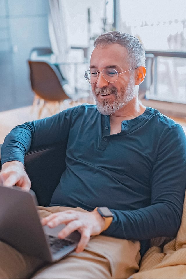 Male therapist sitting on a couch
