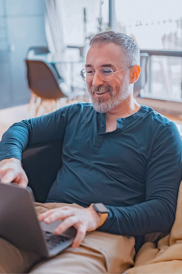 Male therapist sitting on a couch