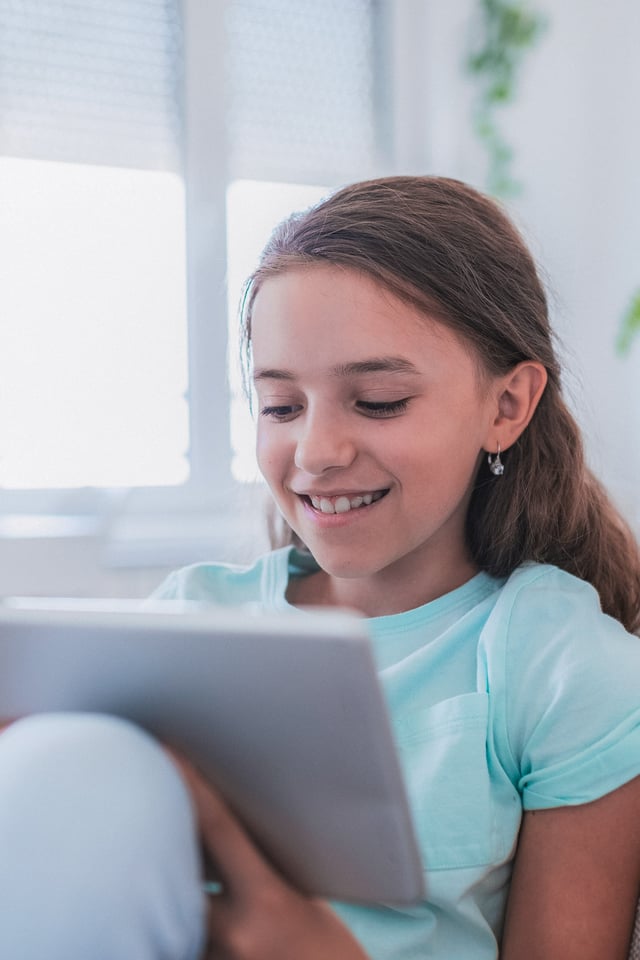 Young girl on a tablet computer