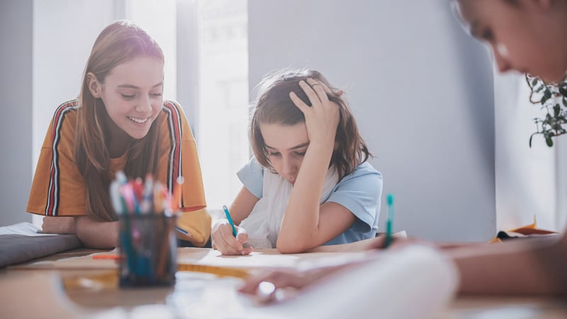 Child stressed while doing schoolwork