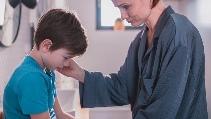 Mom comforting son dealing with the loss of a family member