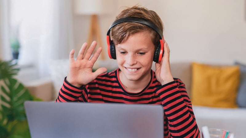 Kid with headphones on participating in therapy