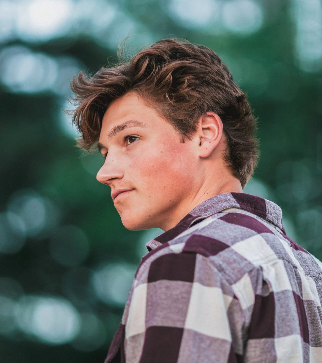Teen boy looking off to the side