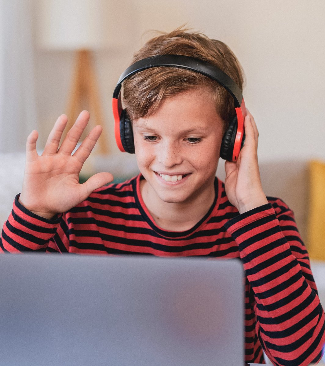 Kid with headphones on participating in therapy