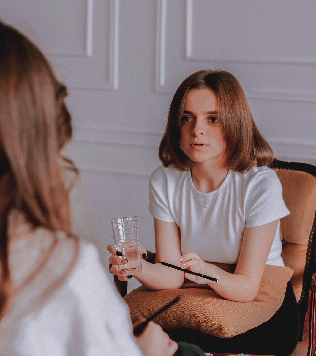 young girl talking during therapy session
