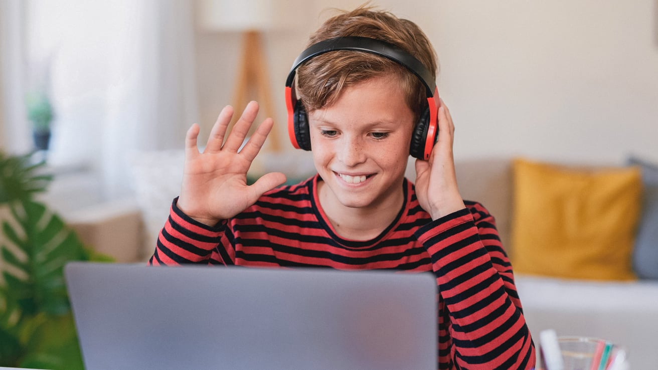Kid with headphones on participating in therapy
