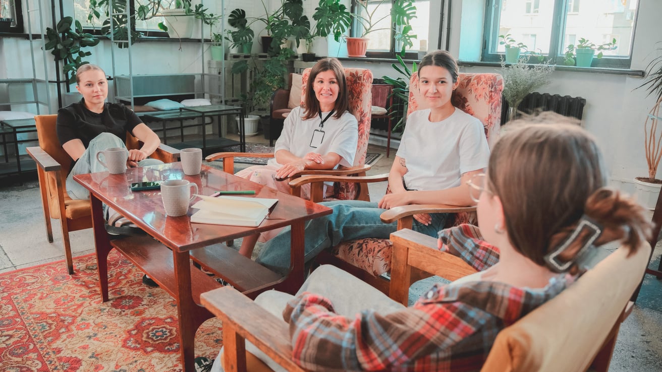 Kids in group therapy session with therapist