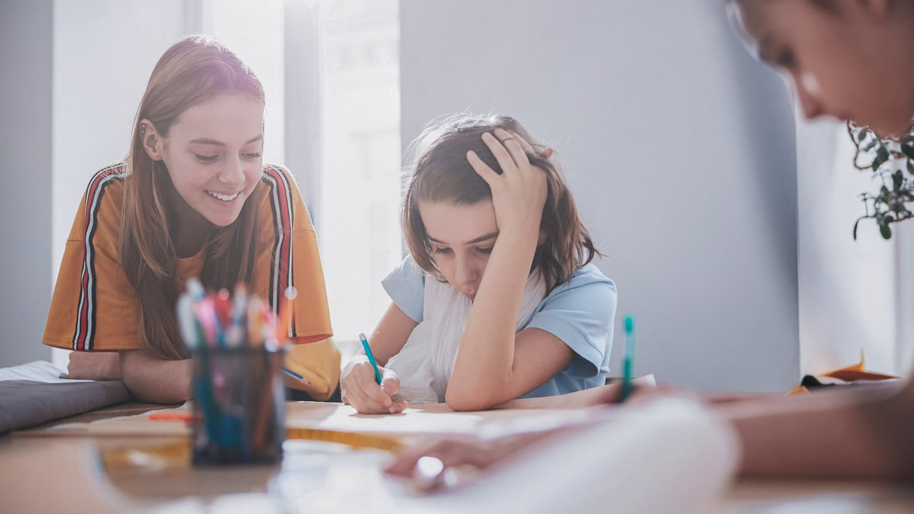 Child stressed while doing schoolwork