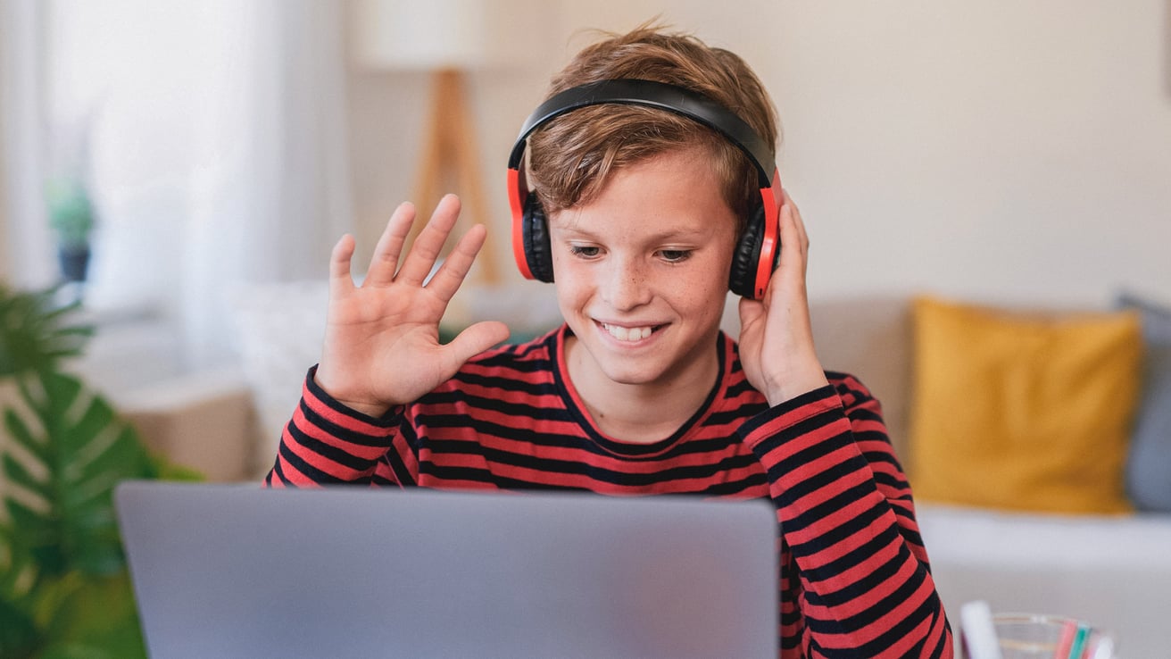 Kid with headphones on participating in therapy