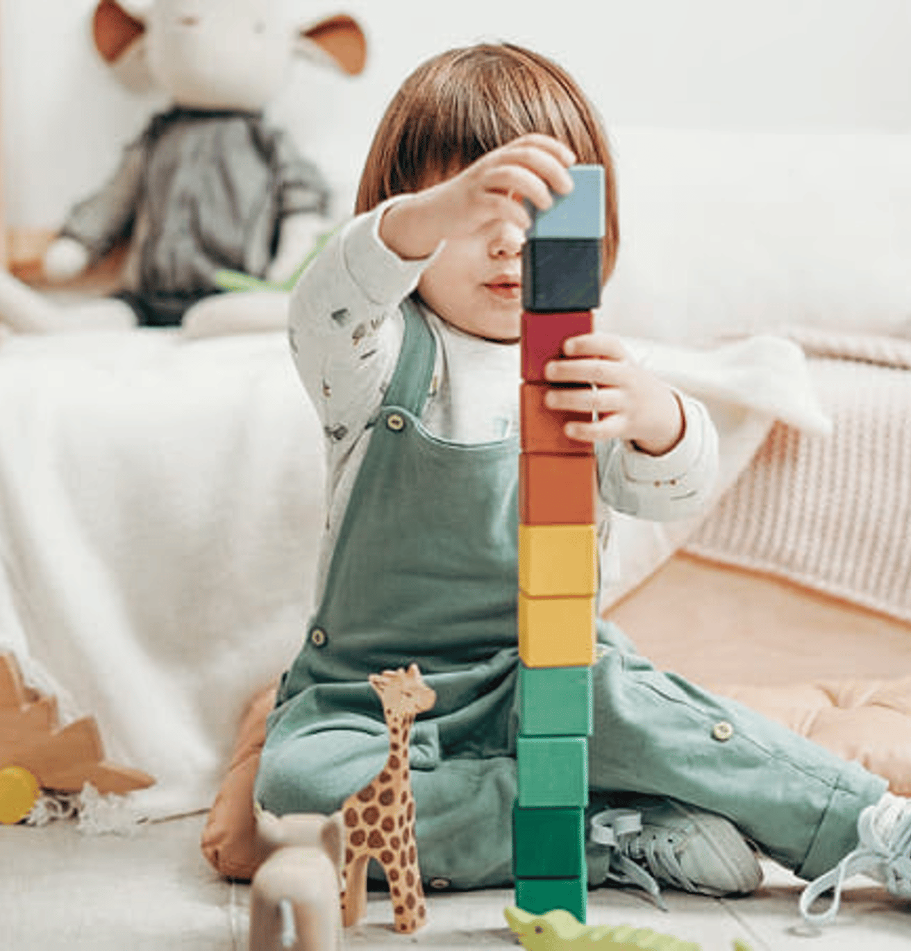 kid playing with blocks