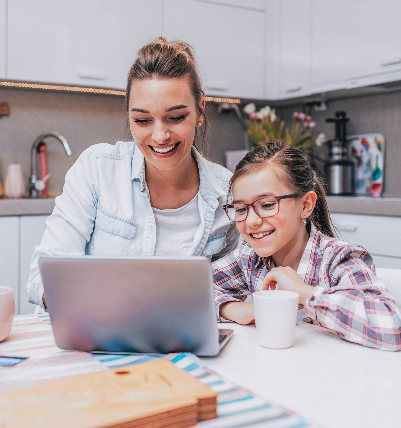 Mom and daughter at the computer together
