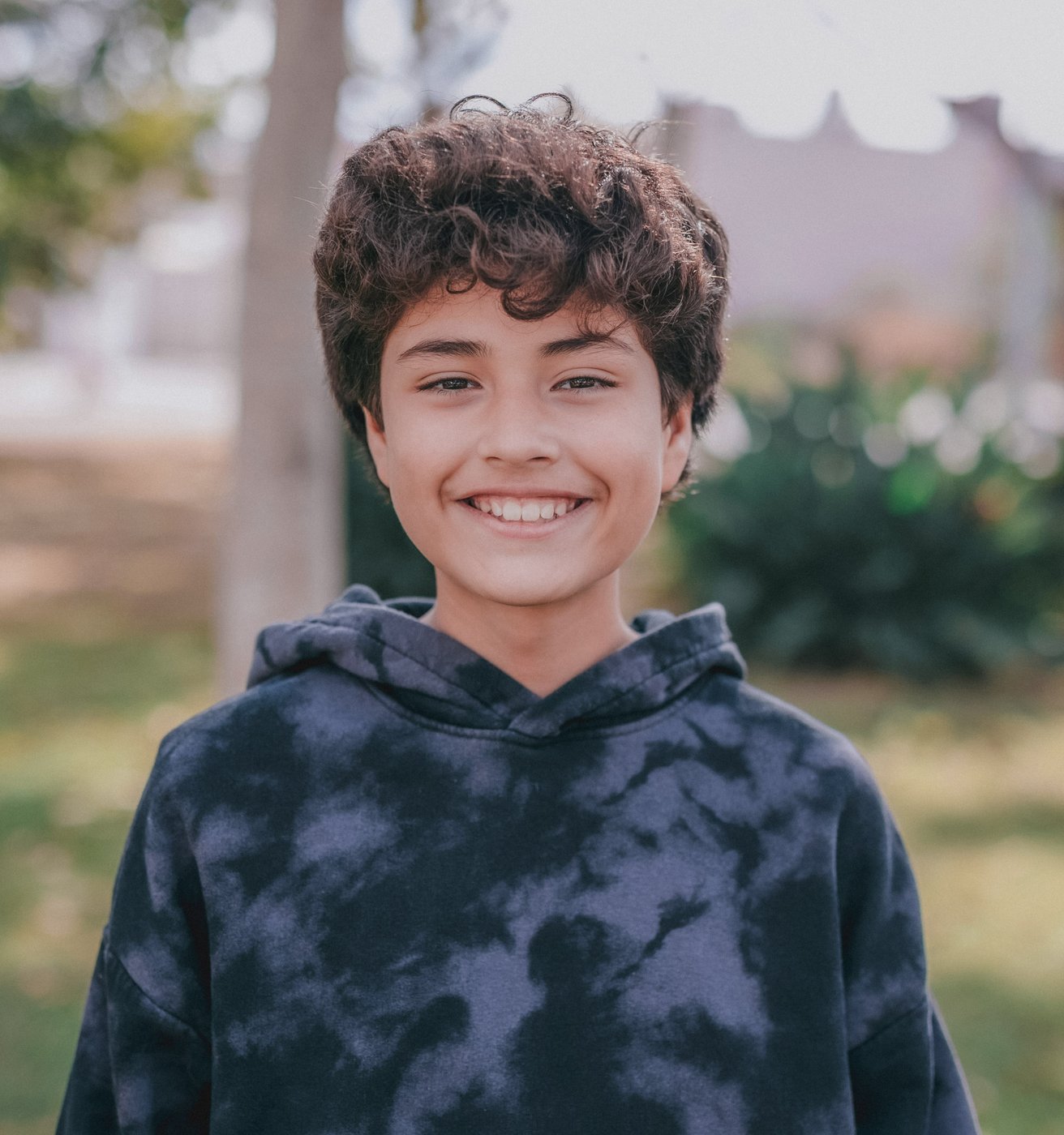 young boy smiling at camera