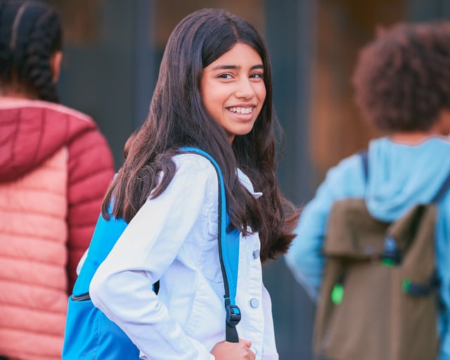 Young girl going to school