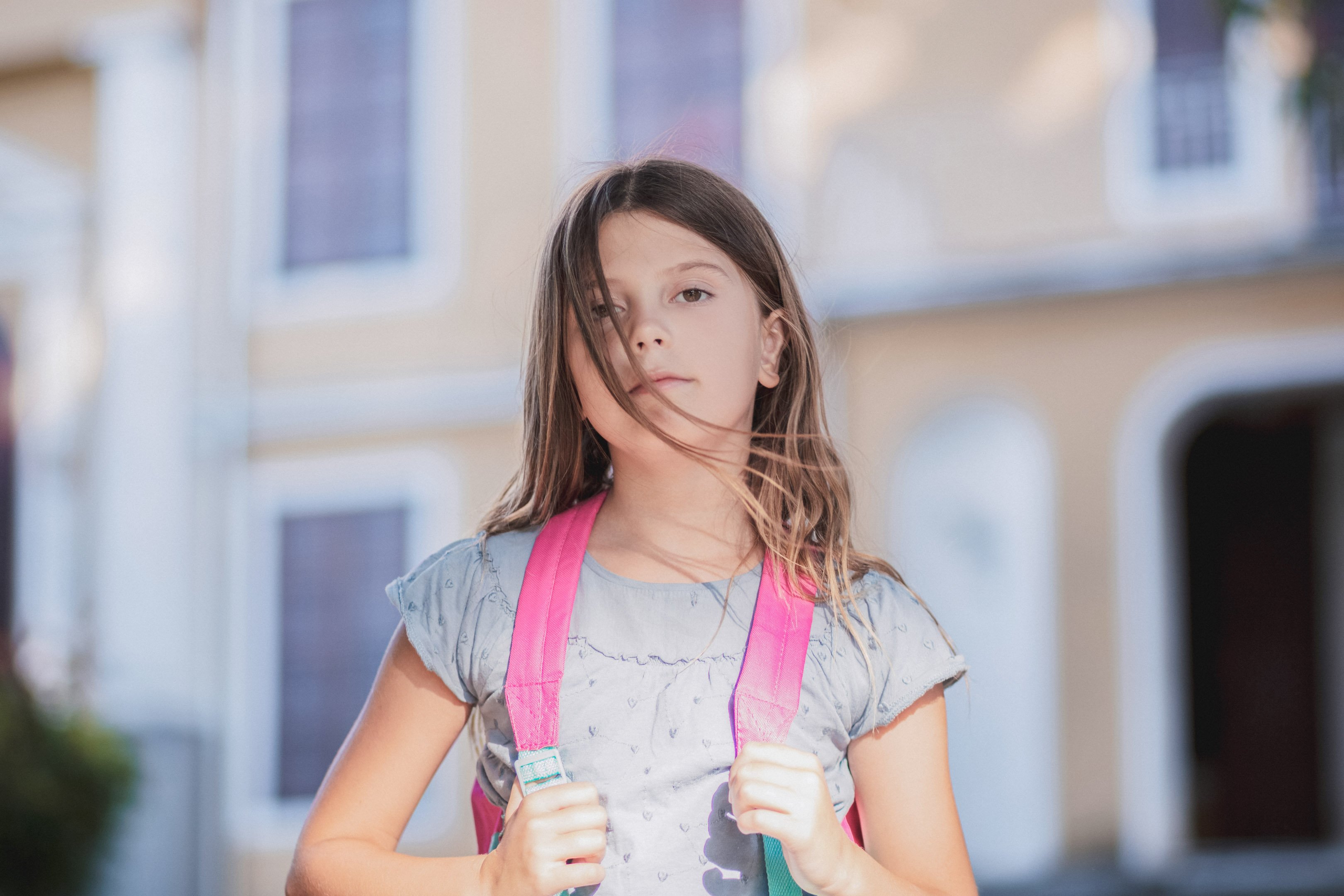 Kid with a backpack dealing with anxiety