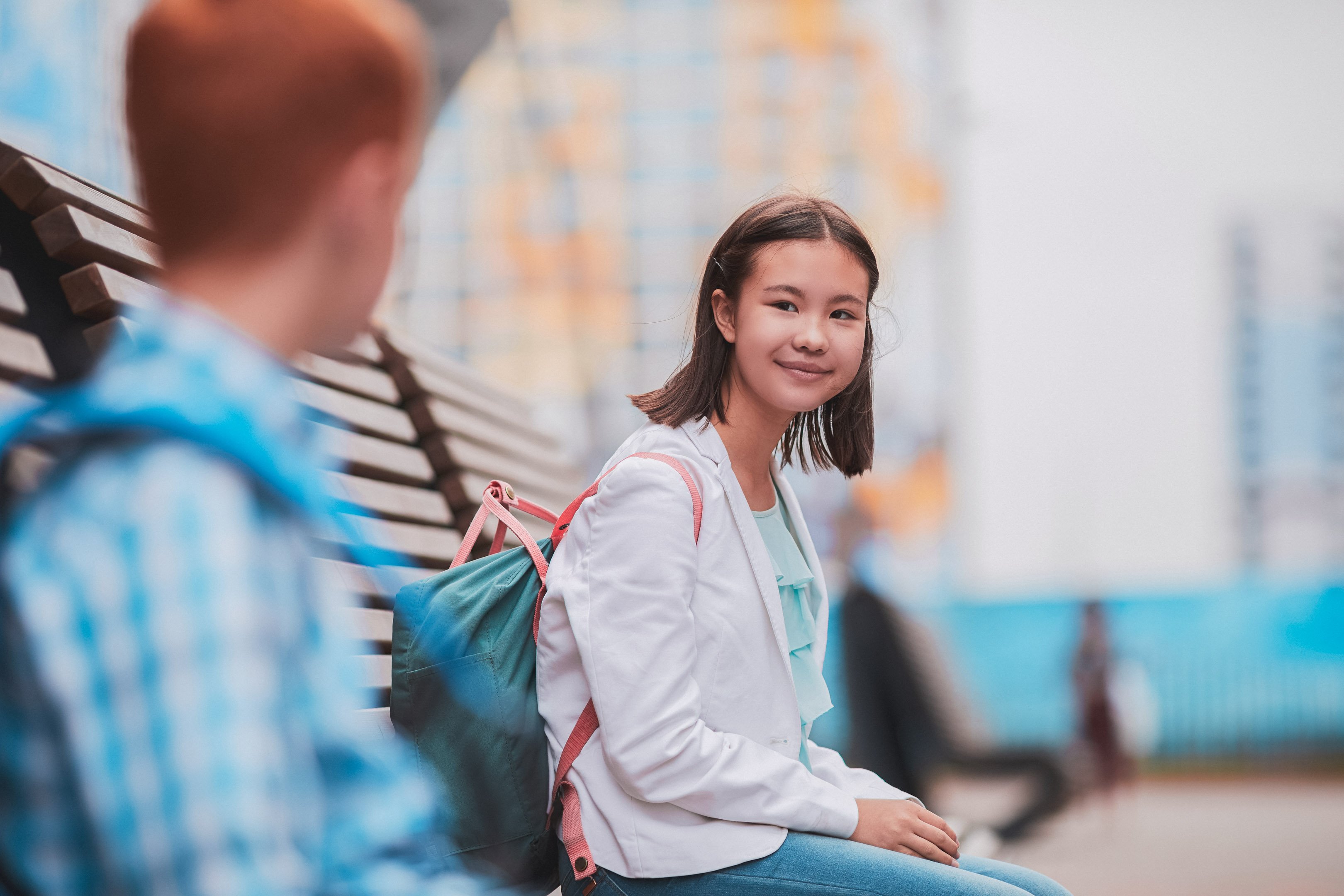 Girl sitting on a park bench