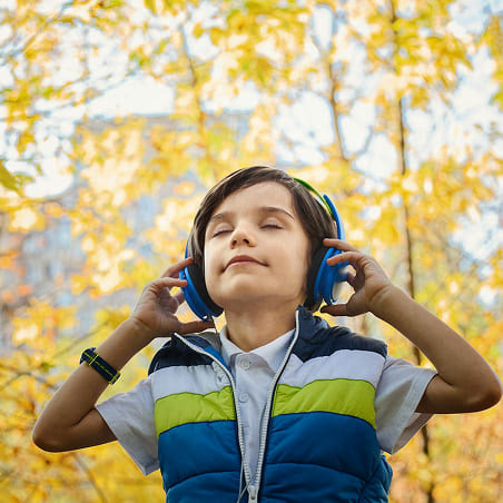 kid listening to music