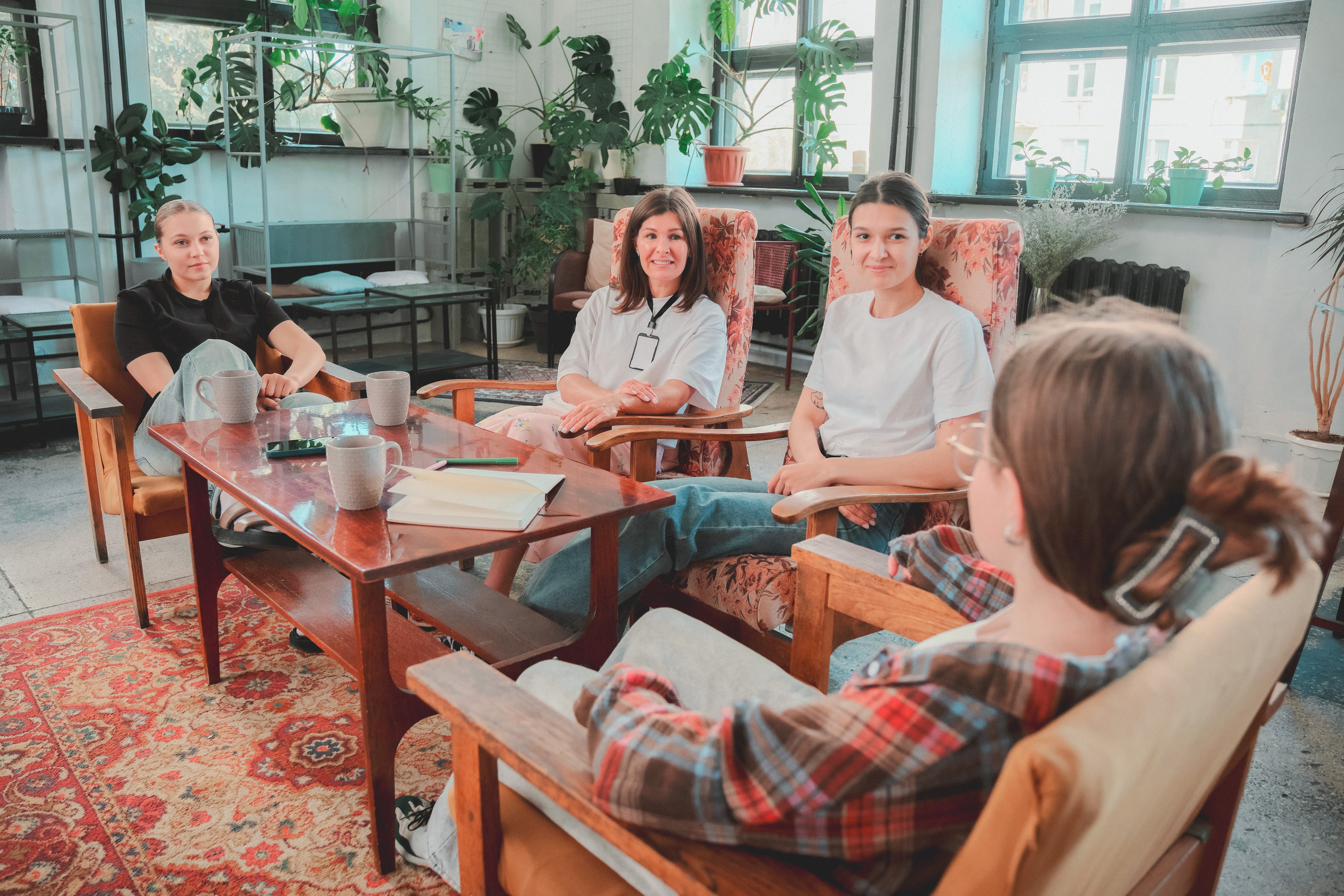 Kids in group therapy session with therapist