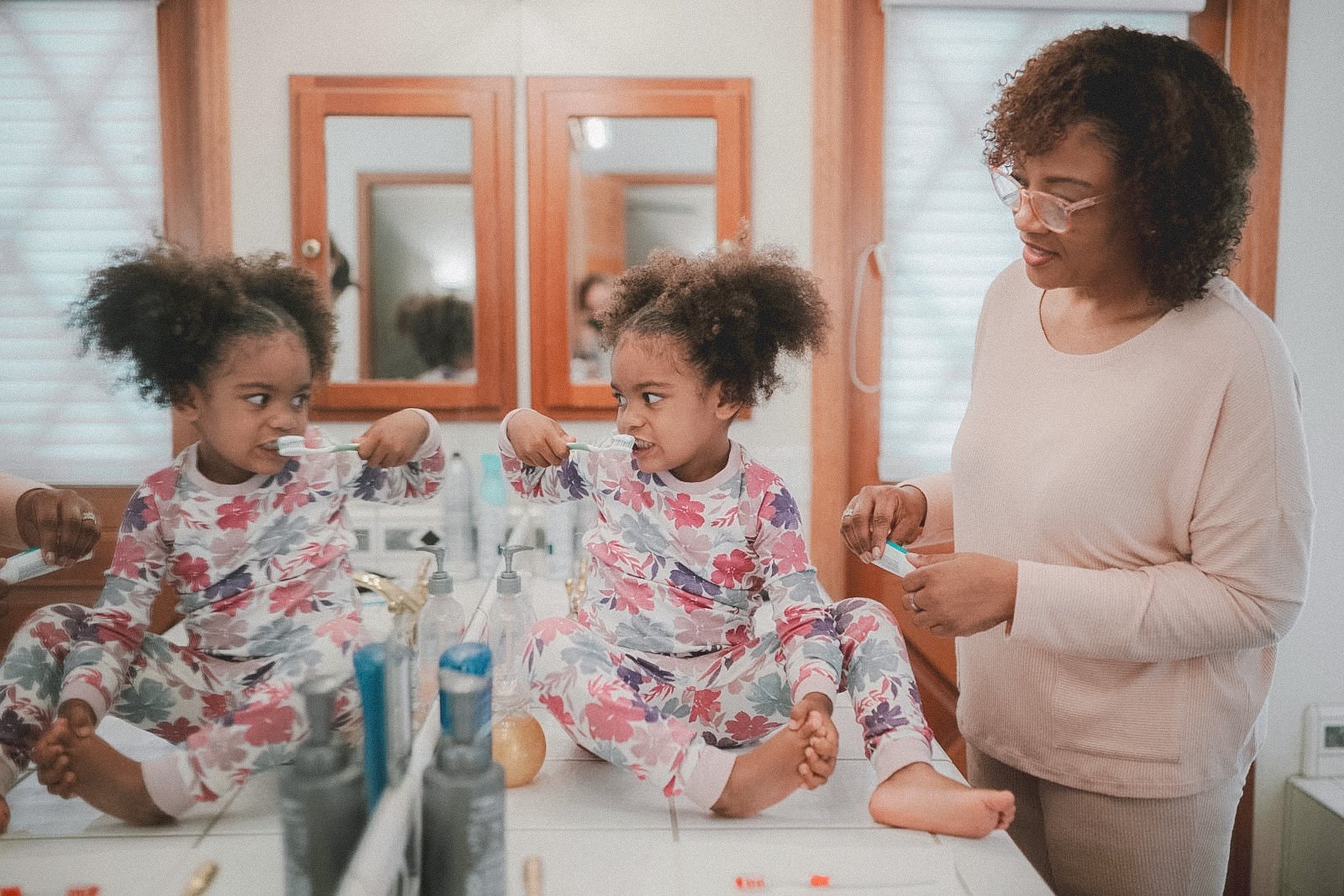 Mom and daughter practicing self care