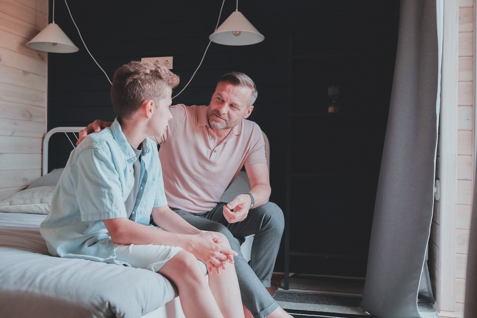 Parent talking to his child about boundaries