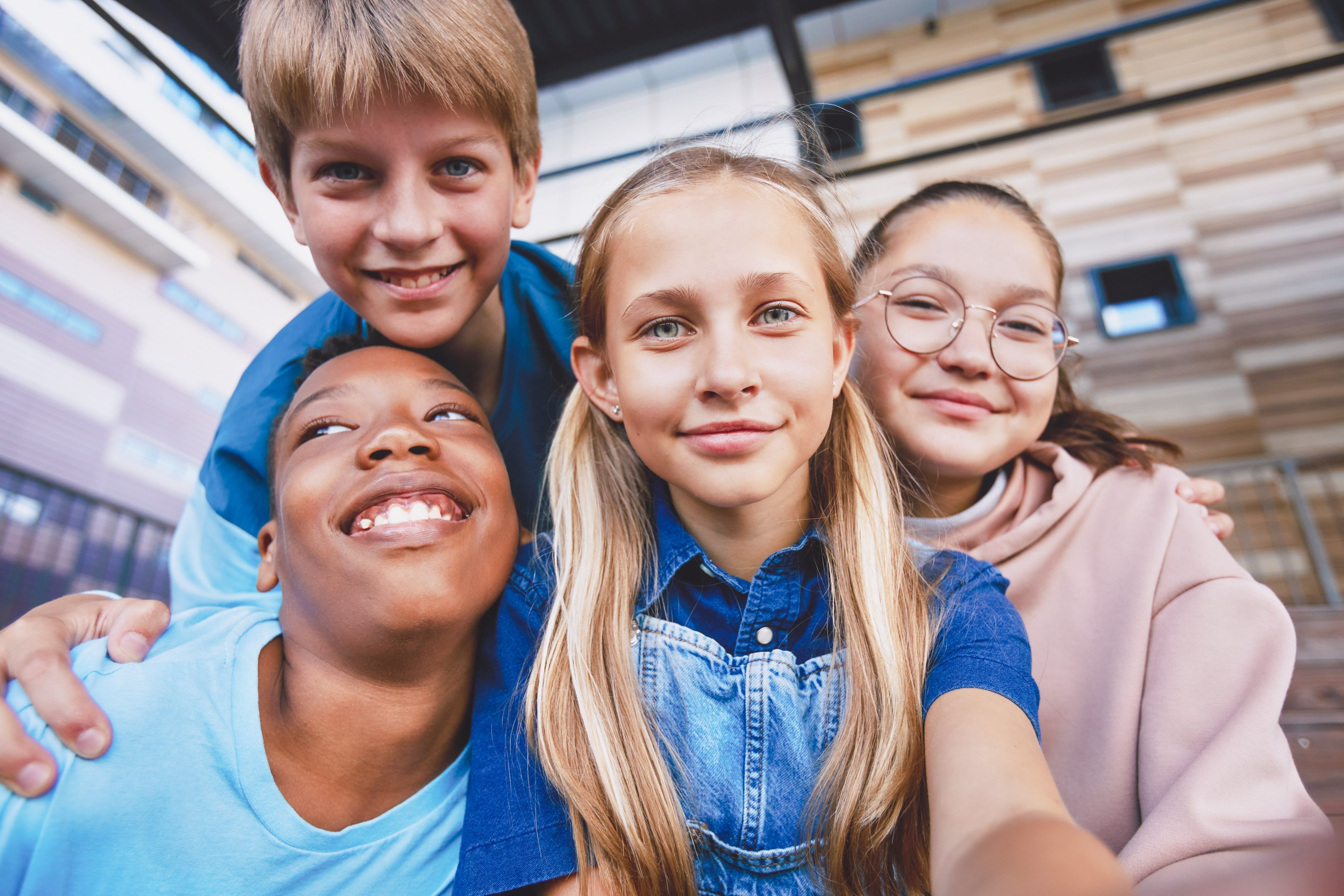 Group of young kids taking a selfie