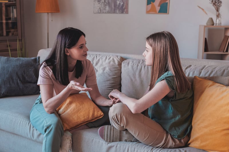 Parent talking to their child about a medication