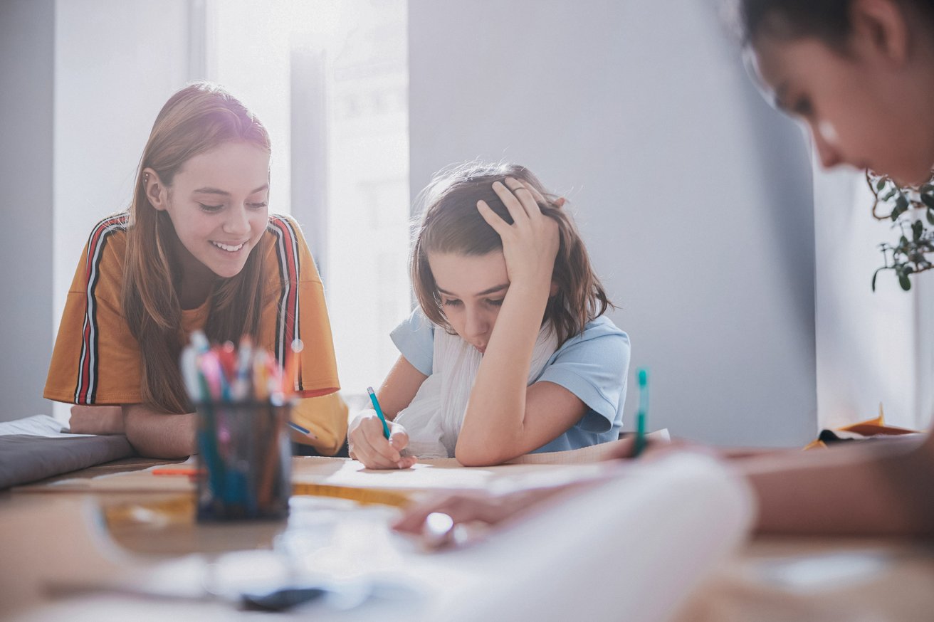 Child stressed while doing schoolwork