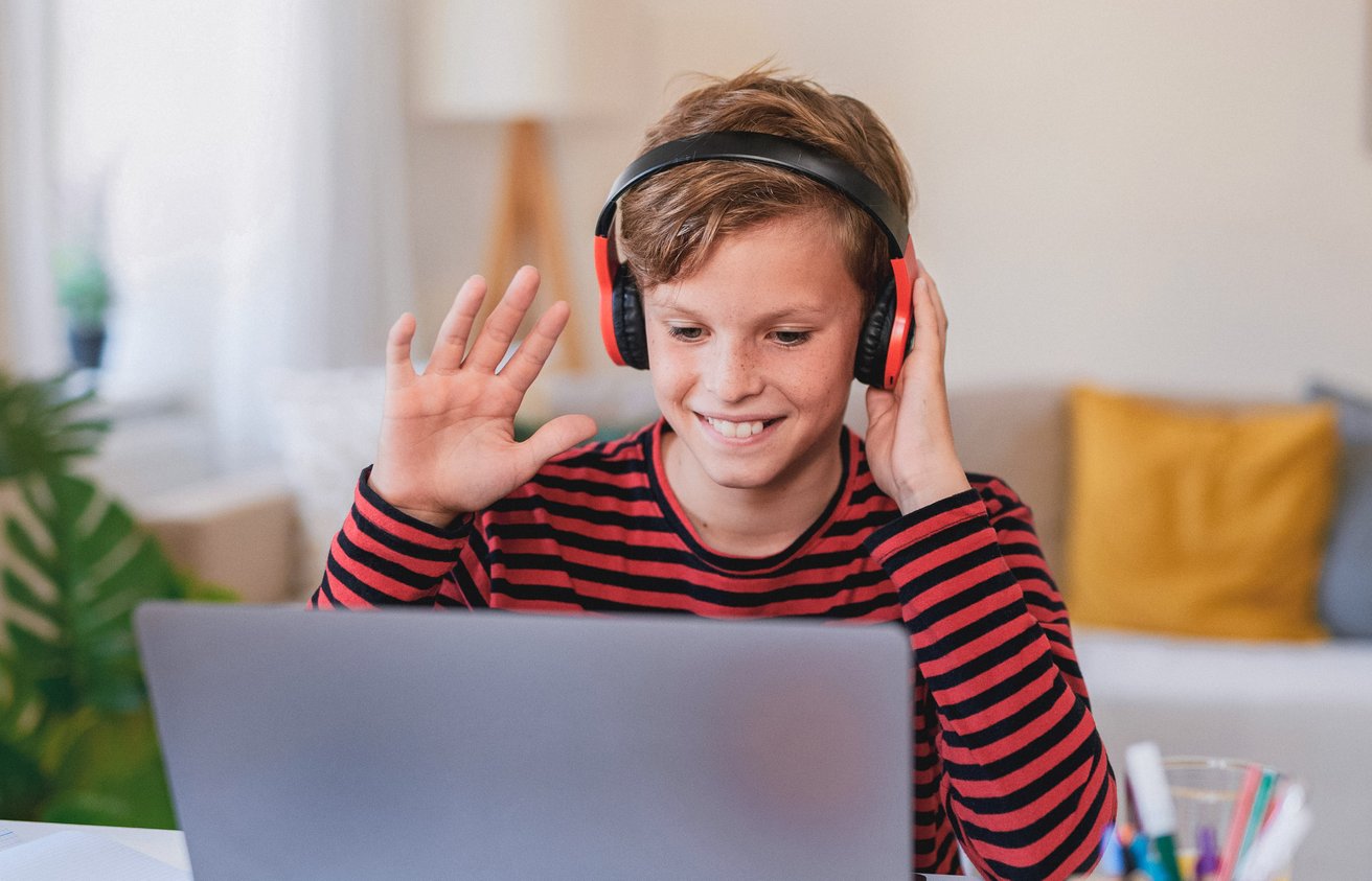 Kid with headphones on participating in therapy