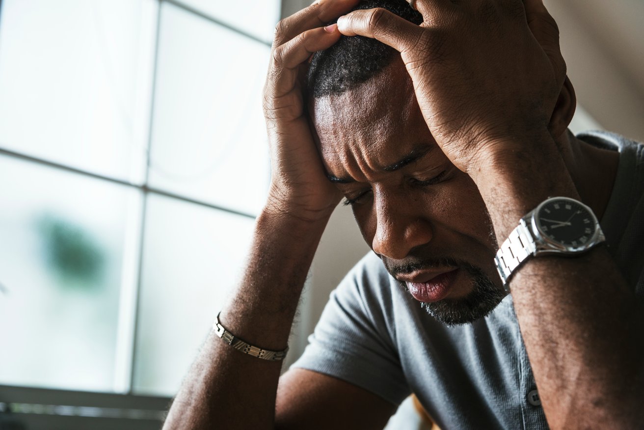Young man looking depressed