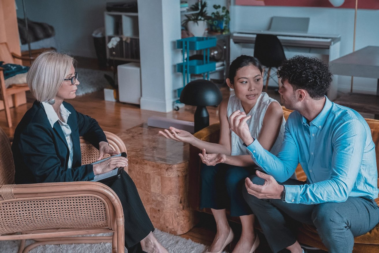 Parents talking to a school principle
