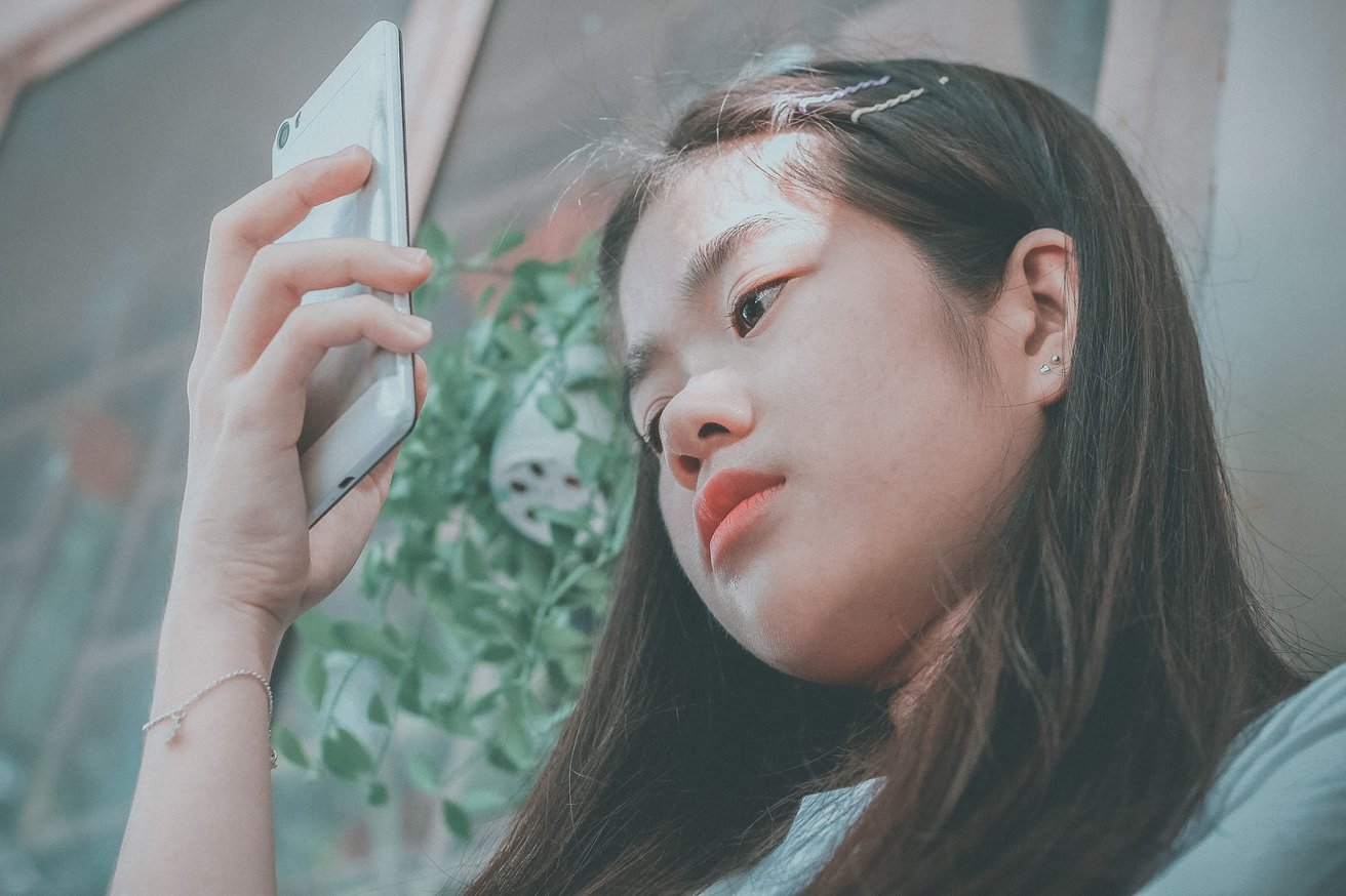 Teen girl checking social media