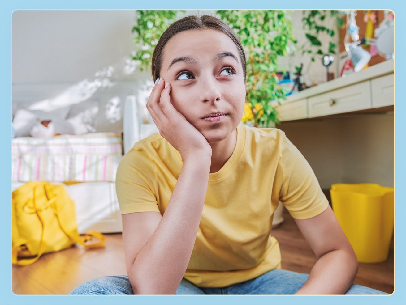 young girl in a yellow shir