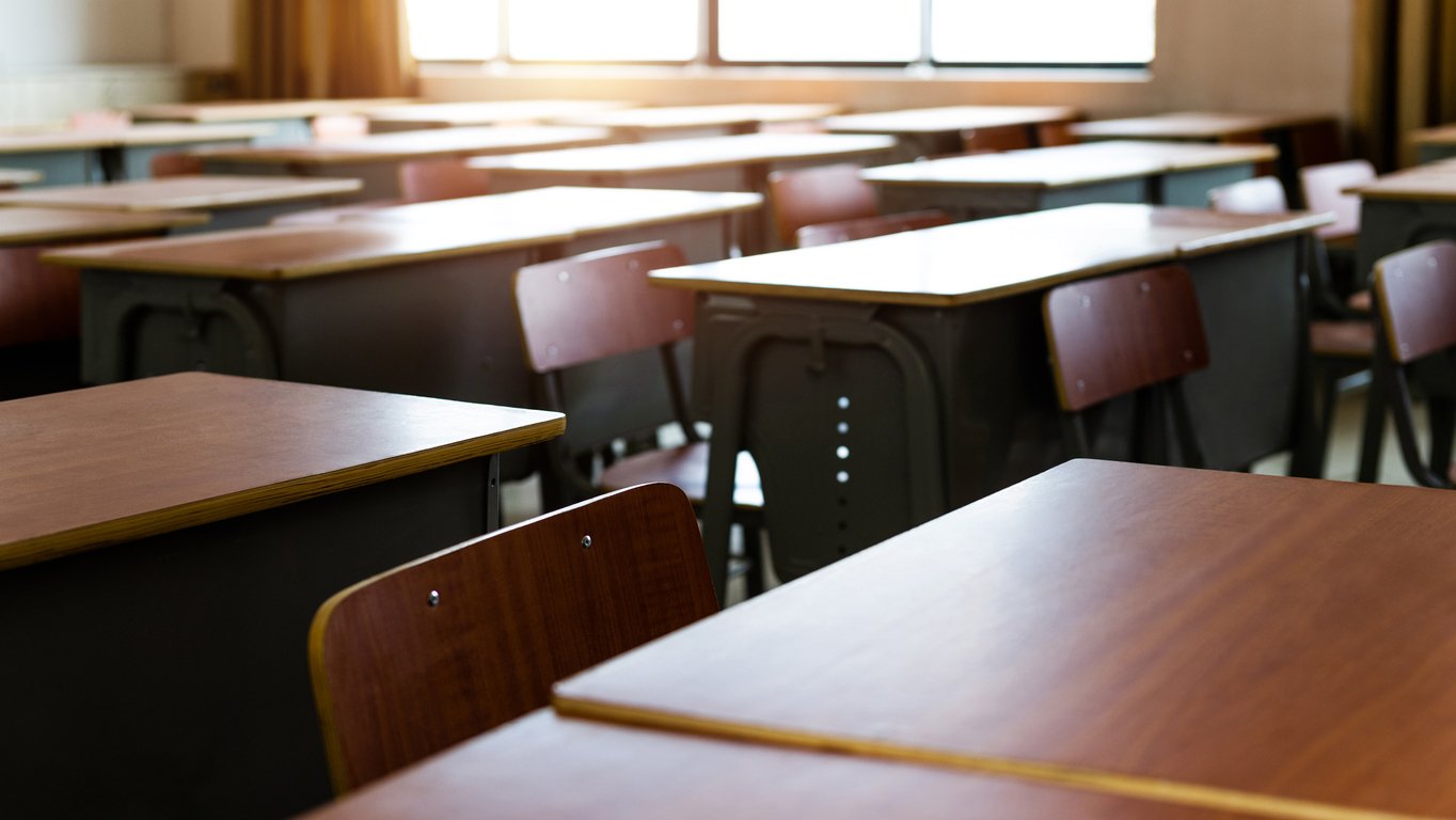 Empty classroom with desks