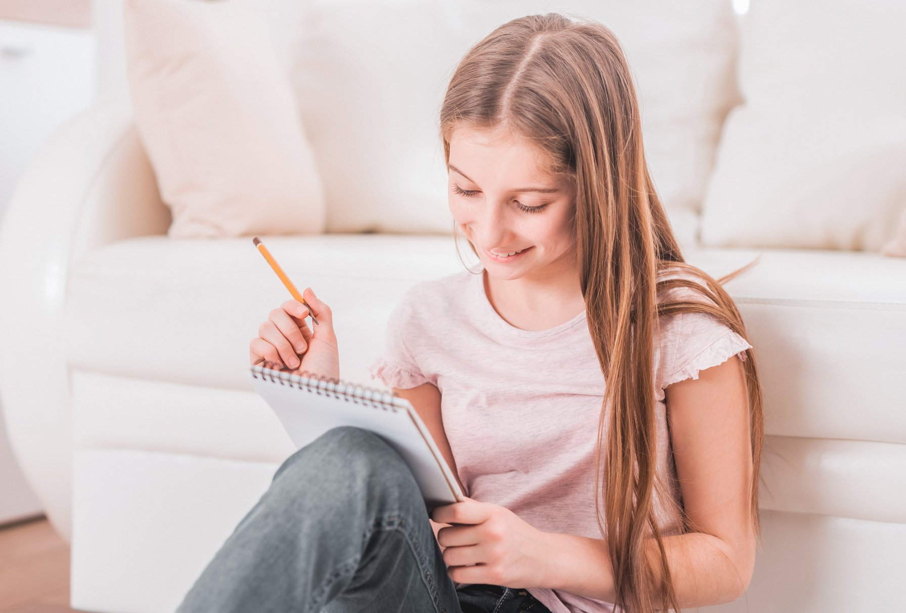 Girl overcoming ADHD paralysis and writing notes