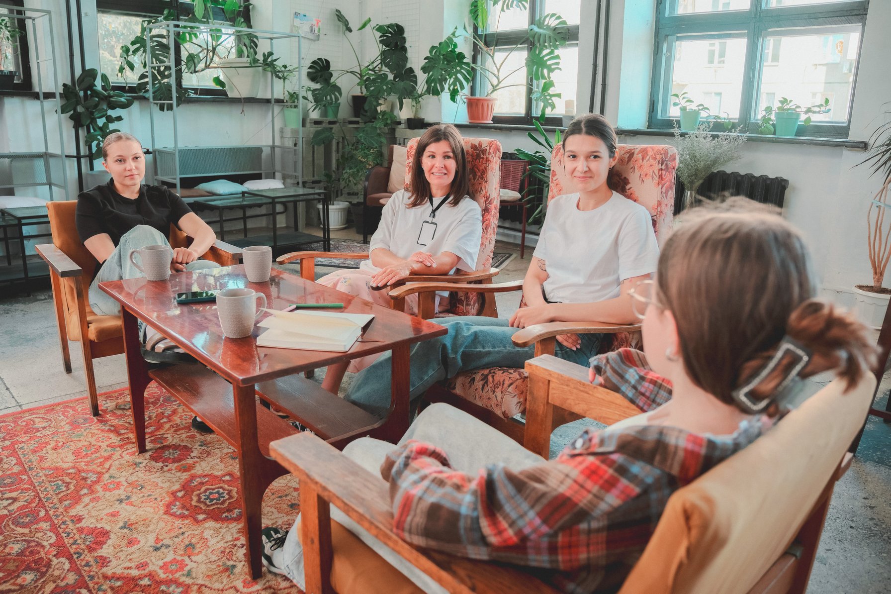 Kids in group therapy session with therapist