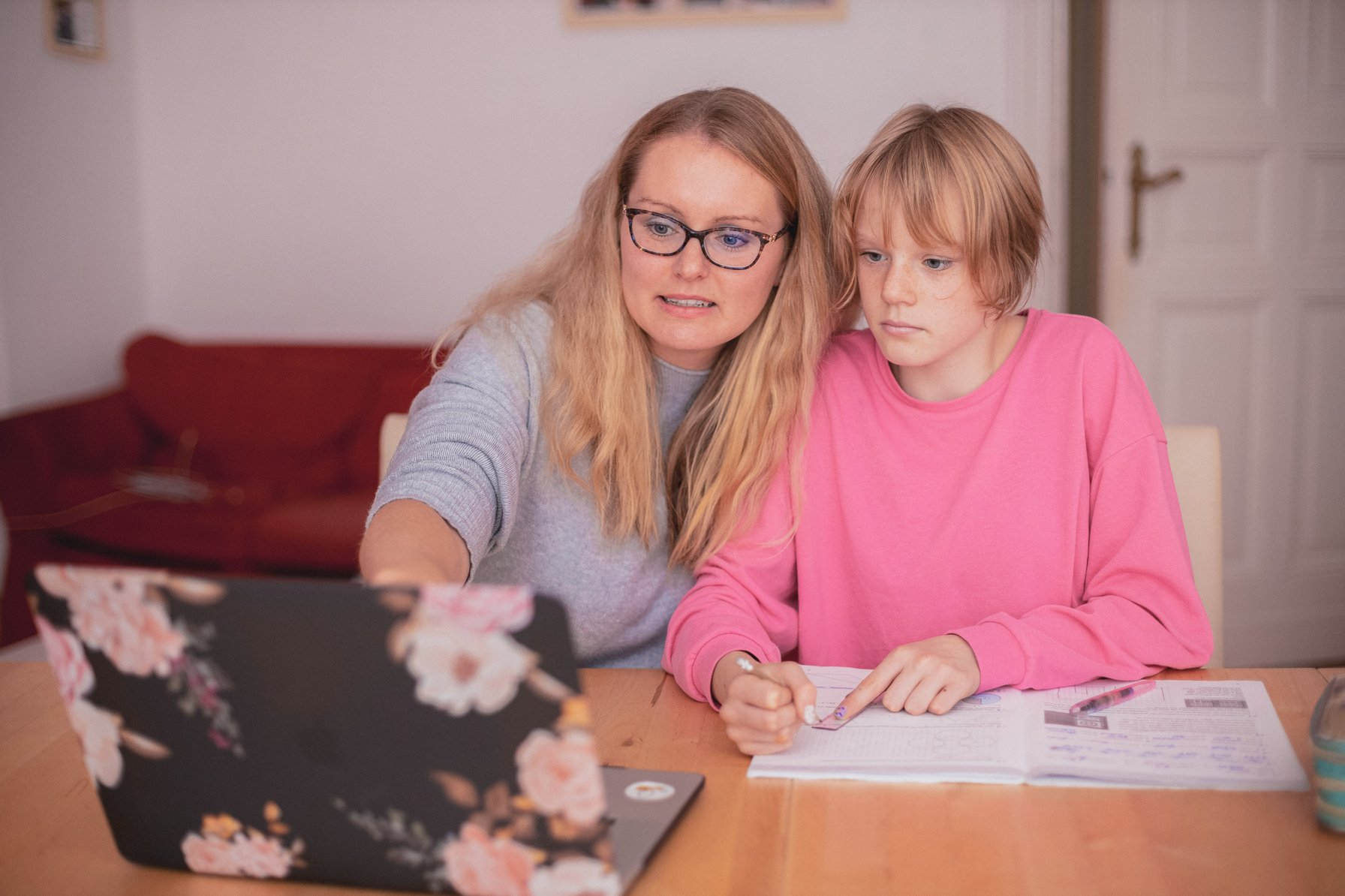 Mom helping daughter with her therapy homework